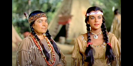 Yvette Duguay as Starfire, fearing Colorados is losing interest in her and falling for the white woman in camp in Cattle Queen of Montana (1954)