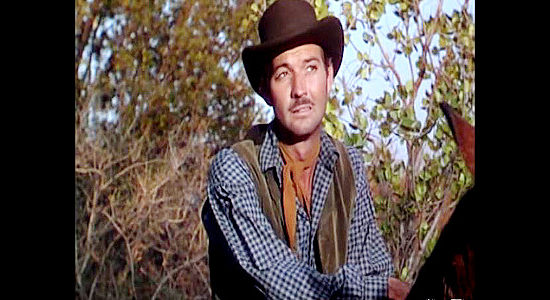 Zachary Scott as Jason Brett, watching his gang chase down an ambushed stagecoach in Colt .45 (1950)
