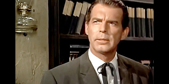 Fred MacMurray as Judge Jim Scott, a man who won't be swayed by public pressure in Day of the Badman (1958)