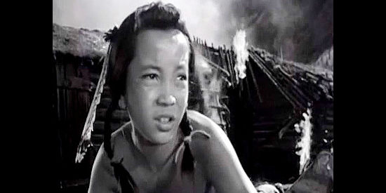 Henry Marco as Jimmy, a young Indian boy watching the attack on Sweet Meadows in Devil's Doorway (1950)