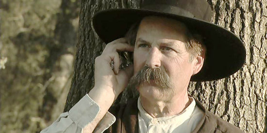 Pat McIntire as the Uncle, listening to a stolen watch in Living By the Gun (2011)