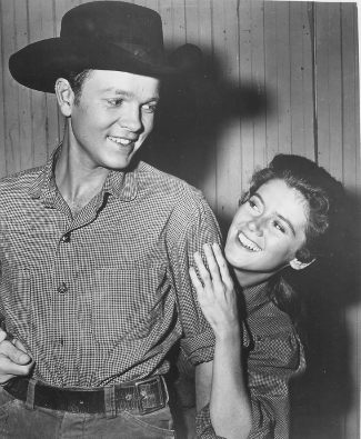 Robert Arthur as Lonny Kesh and Kathleen Nolan as Alice Rutherford in The Desperadoes are in Town (1956)