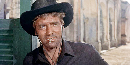 Burt Lancaster as Joe Erin, watching Benjamin Trate meet his gang of gunmen in Vera Cruz (1954)