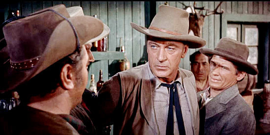 Gary Cooper as Benjamin Trane, meeting Joe Erin's men, including Donnegan (Ernest Borgnine, left) and Pittsburgh (Charles Bronson, right) in Vera Cruz (1954)