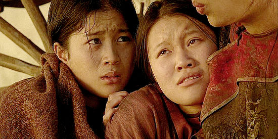 Jadyn Wong as Ghee Moon, number one, and Caroline Chan as Mai Ling, number two, among the Chinese girls rescued in Broken Trail (2006)