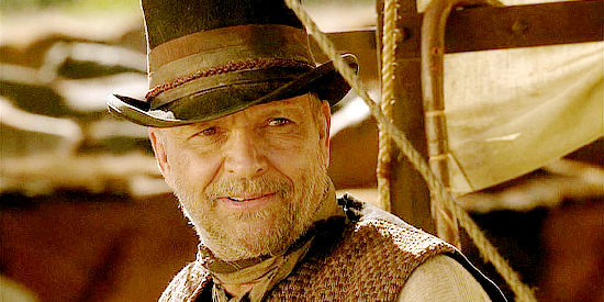 James Russo as Capt. Billy Fender, the man hired to transport five Chinese girls to a whorehouse in Broken Trail (2006)