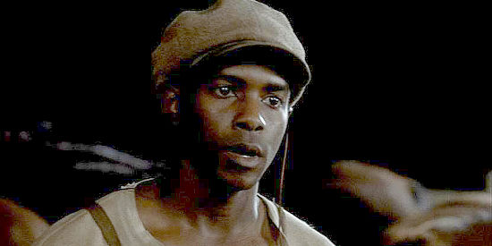 Keith Robinson as Joshua Deets, the man trusted to get the Texas Rangers back to Austin in Comanche Moon (2008)
