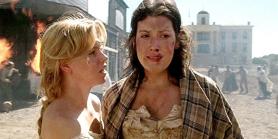 Melanie Lyndsky as Pearl Coleman, pronouncing herself ruined to Maggie after the Comanches leave Austin in Comanche Moon (2008)