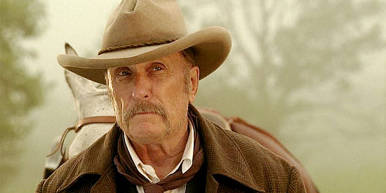 Robert Duval as Prentice Ritter, proposing the horse drive to Tom Harte in Broken Trail (2006)