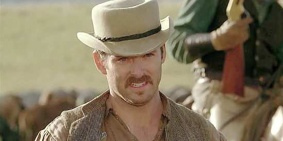 Scott Cooper as Henry 'Heck' Gilpin, the man Tom Harte hires to help out on the horse drive in Broken Trail (2006)