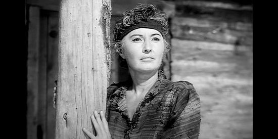 Barbara Stanwyck as Cora Sutliff, rescued from captivity in Trooper Hook (1957)