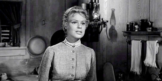 Betsy Palmer as Nona Mayfield, the woman who offers Morg Hickman a place to stay when he's ostracized by the rest of town in The Tin Star (1957)