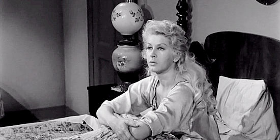 Carol Kelly as Molly, Johnny Crale's girl, in Terror in a Texas Town (1958)