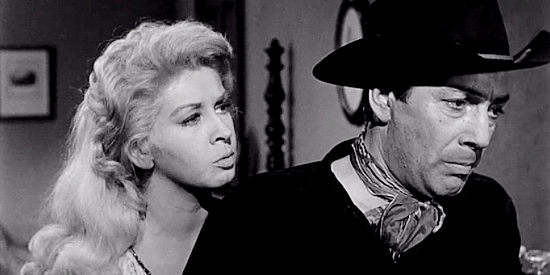 Carol Kelly as Molly and Nedrick Young as hired gun Johnny Crale in Terror in a Texas Town (1958)