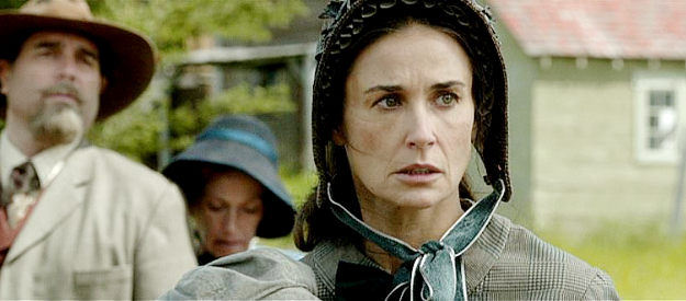 Demi Moore as Mary Alice Watson, watching a confrontation between husband Tom and former lover John Henry in Forsaken (2015)