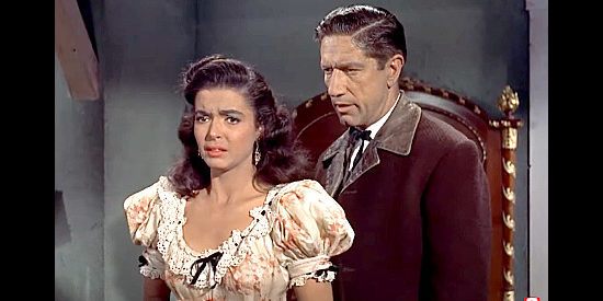 Donna Martell as Maria Segura, cringing at the idea of taking Wick Campbell (Richard Boone) as her love in Ten Wanted Men (1955)