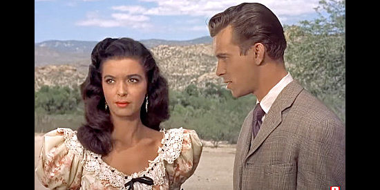 Donna Martell as Maria Segura, meeting Skip Homeier and arousing the jealousy of Wick Campbell in Ten Wanted Men (1955)