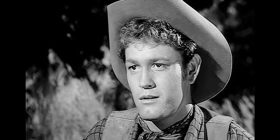 Earl Holliman as Jeff Bennett, the cowboy who warns of Indian trouble in Trooper Hook (1957)