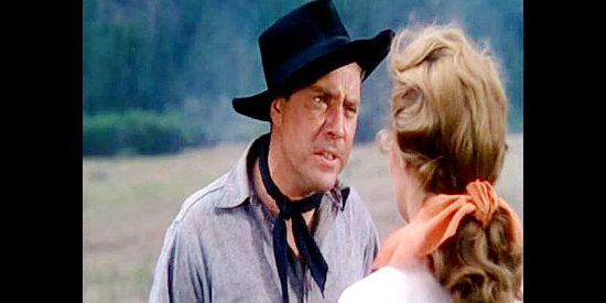 Edmund O'Brien as Jim Vesser, confronting Linda about her divided loyalties in The Denver and Rio Grande (1952)