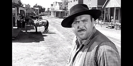 Gerald Milton as Ike Clanton, an outlaw on the lookout for trouble in Toughest Gun in Tombstone (1958)