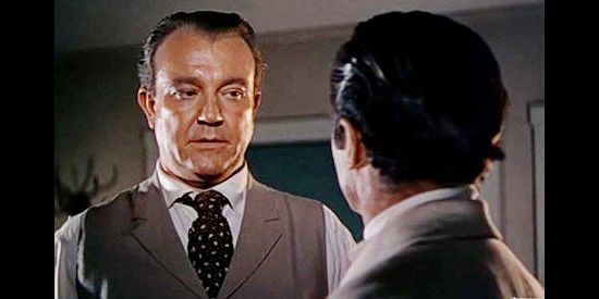Hugh Sanders as H.L. Balfour, a carpetbagger capitalizing on the misfortune of Texans in Thunder Over the Plains (1953)
