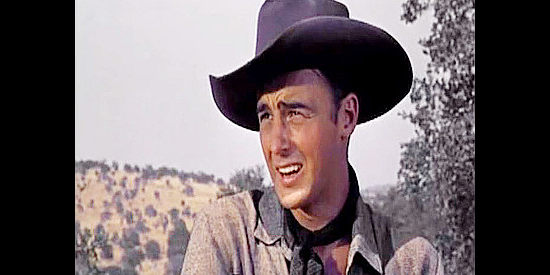 Jerome Courtland as Danny Bonner, thrilled to be on the trail with older brother Johnny Carver in Texas Rangers (1951)