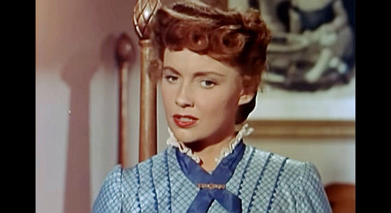 Joan Leslie as Mary Kimber, living with Matt Landry after he rescued her following an Indian attack in Toughest Man in Arizona (1952)