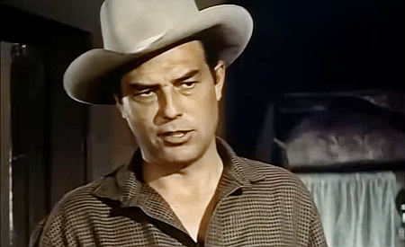 John Compton as Tab Warren, explaining why Plummer wants his family's mine in Thunder Over Arizona (1956)