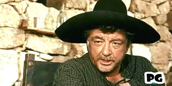 Jose Calvo as Carranza, the old-timer who trains Hud in the art of the six-gun in For One Thousand Dollars Per Day (1966)