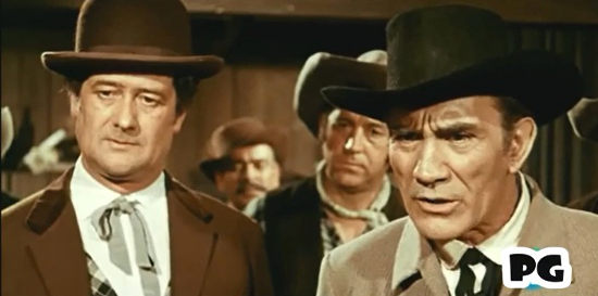 Jose Villasante as Clayton (right) and other property owners demand action against the Clark brothers in For One Thousand Dollars Per Day (1966)