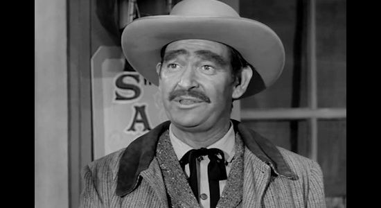 Ken Mayer as Joe Emery, the businessman who lures Wayne Santley to Jackson Hole to trap furs and escape his brother's outlaw shadow in Gun Fight (1961)