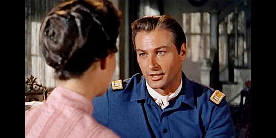 Lex Barker as Capt. Bill Hodges, trying to get closer to Nora Porter in Thunder Over the Plains (1953)