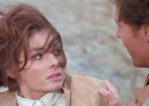 Luisa Barrato (Louise Barrett) as Manuela, surprised by Stuart (Edd Byrnes) in Payment in Blood (1967)