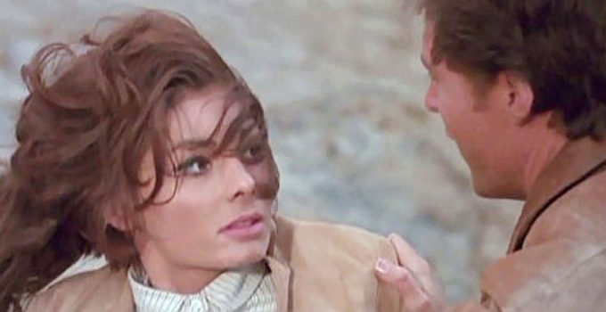 Luisa Barrato (Louise Barrett) as Manuela, surprised by Stuart (Edd Byrnes) in Payment in Blood (1967)