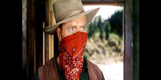 Lyle Bettger as Johnny Buff, leading a payroll robbery in The Denver and Rio Grande (1952)