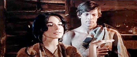 Marilu Tolo as Manila teaching Winchester Jack (Charles Southwood) a lesson in the cost of romance in Roy Colt and Winchester Jack (1970)