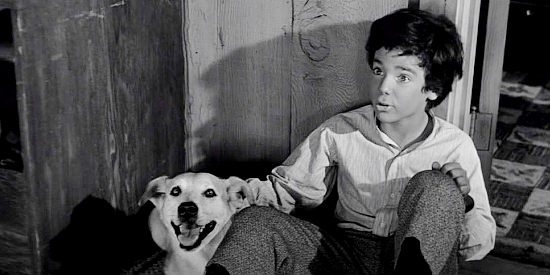 Michel Ray as the half-breed boy Kip Mayfield, who finds a father figure when Morg Hickman comes to town in The Tin Star (1957)