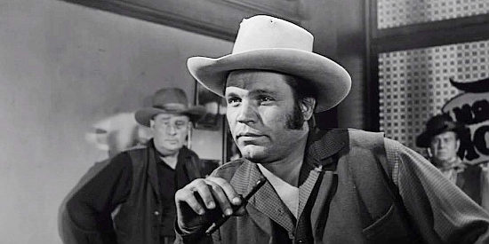Neville Brand as Bart Bogardes, the man constantly trying to stir up trouble for new Sheriff Ben Owens in The Tin Star (1957)