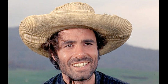 Nino Castelnuovo as Luis Dominguez, rounding up recruits for The Dutchman in The Five Man Army (1969)