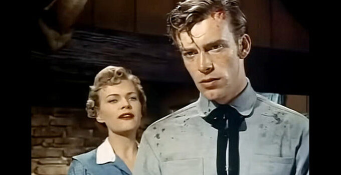 Kristine Miller as Fay Warren and Skip Homeier as Tim Mallory in Thunder Over Arizona (1956)
