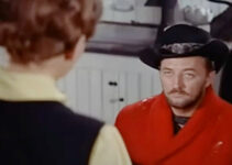 Robert Mitchum as Curt Bridges, making Gwen Williams uncomfortable again in Track of the Cat (1954)