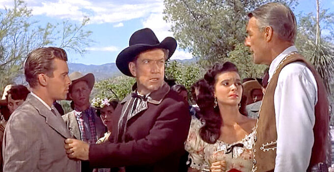 Skip Homeier as Howie Stewart, Richard Boone as Wick Campbell, Donna Martell as Maria Segura and Randolph Scott as John Stewart in Ten Wanted Men (1955)