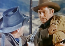 Vaughn Monroe as Matt Landry, tussling with Frank Girard in Toughest Man in Arizona (1952)