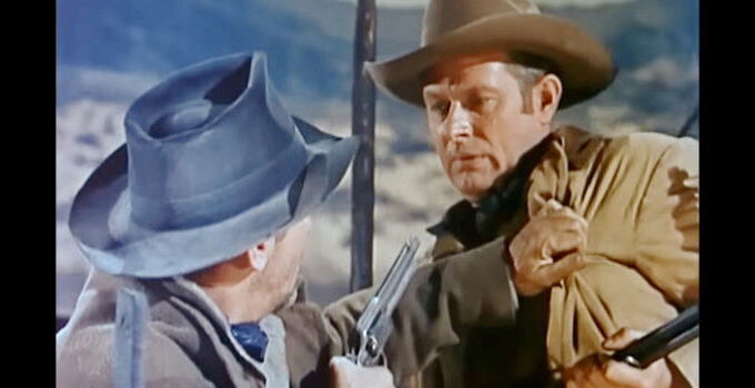 Vaughn Monroe as Matt Landry, tussling with Frank Girard in Toughest Man in Arizona (1952)