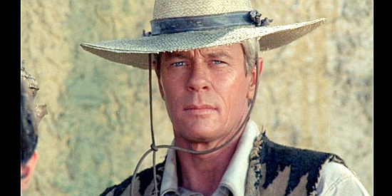 Peter Graves as The Dutchman, rounding up his group of specialists in The Five Man Army (1969)