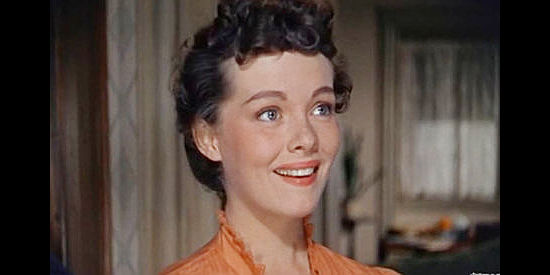 Phylllis Kirk as Nora Porter, eager to hear news from back East in Thunder Over the Plains (1953)