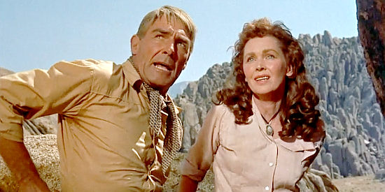 Randolph Scott as Pat Brennan and Maureen O'Sullian as Doretta Mims, facing a desperate situation in The Tall T (1957)