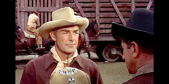 Randolph Scott as cattle rancher John Stewart, accusing Wick Campbell of rustling in Ten Wanted Men (1955)