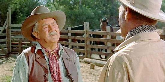 Robert Burton as Tennvoorde, the rancher who wants Pat Brennan to work for him again in The Tall T (1957)