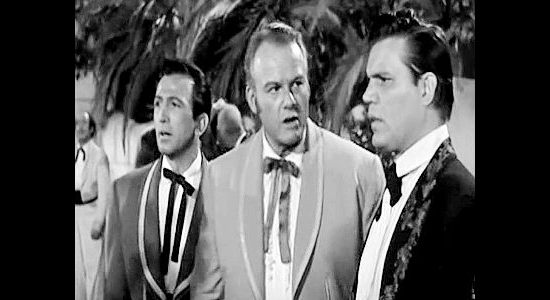 Robert Christopher as Bill Carver, Alan Hale Jr. as Sundance Kid and Neville Brand as Butch Cassidy, shocked by a bank robbery in The Three Outlaws (1956)